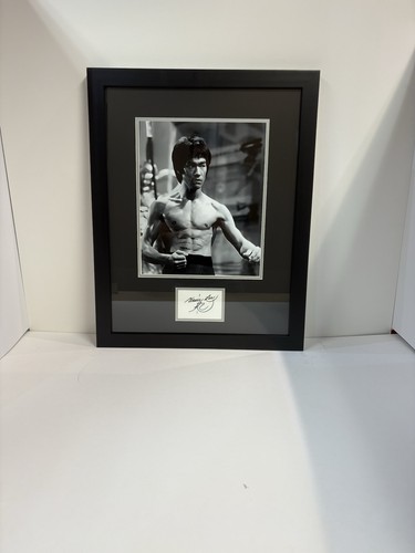 Framed and signed - framed,